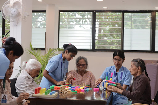 Trained professionals providing expert senior care in Coimbatore facility